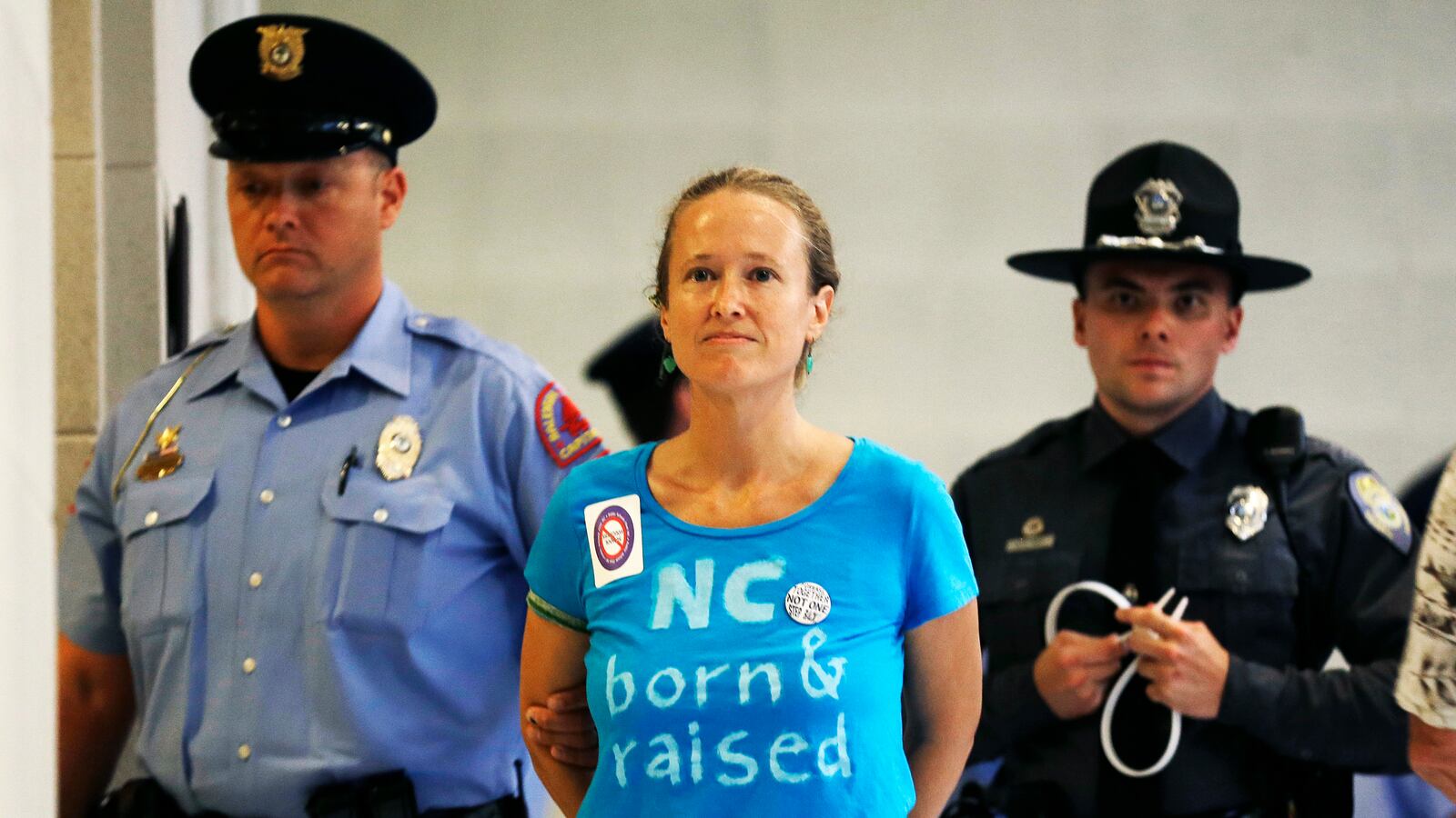 articles/2013/07/23/escaping-arrest-at-the-raleigh-rallies/130722-north-carolina-protests-murphy_fjw0ai