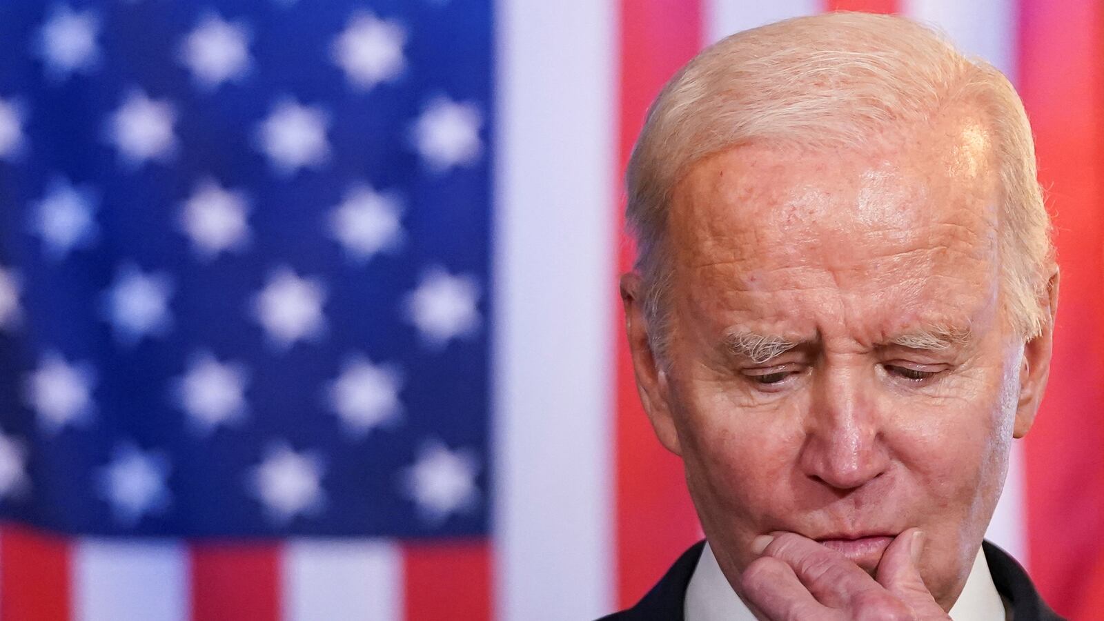 President Joe Biden pauses during a speech in a pub in Dundalk, Ireland, April 12, 2023.