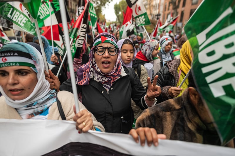 MADRID, SPAIN - 2025/11/15: People shouting carrying Saharawi flags during a demonstration under the slogan "50 years of resistance of the Saharawi people". Thousands gathered in central Madrid calling for a referendum that would enable the Saharawi people to exercise their right to independence and full sovereignty over their territory, demanding Morocco to leave Western Sahara. (Photo by Marcos del Mazo/LightRocket via Getty Images)