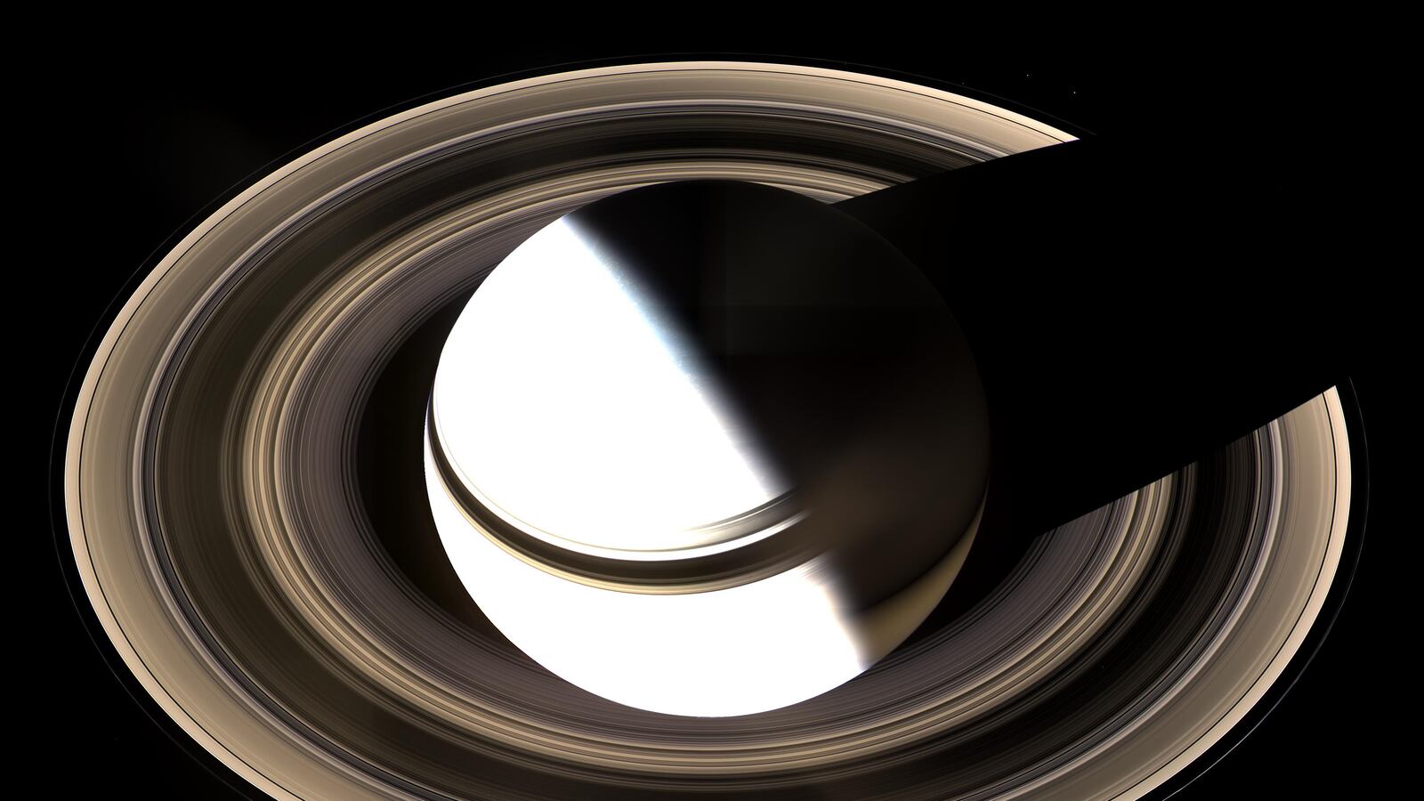 articles/2015/08/16/cassini-buzzes-saturn-s-moons-for-the-last-time/150814-branom-saturn-moons-tease_jfxo7p