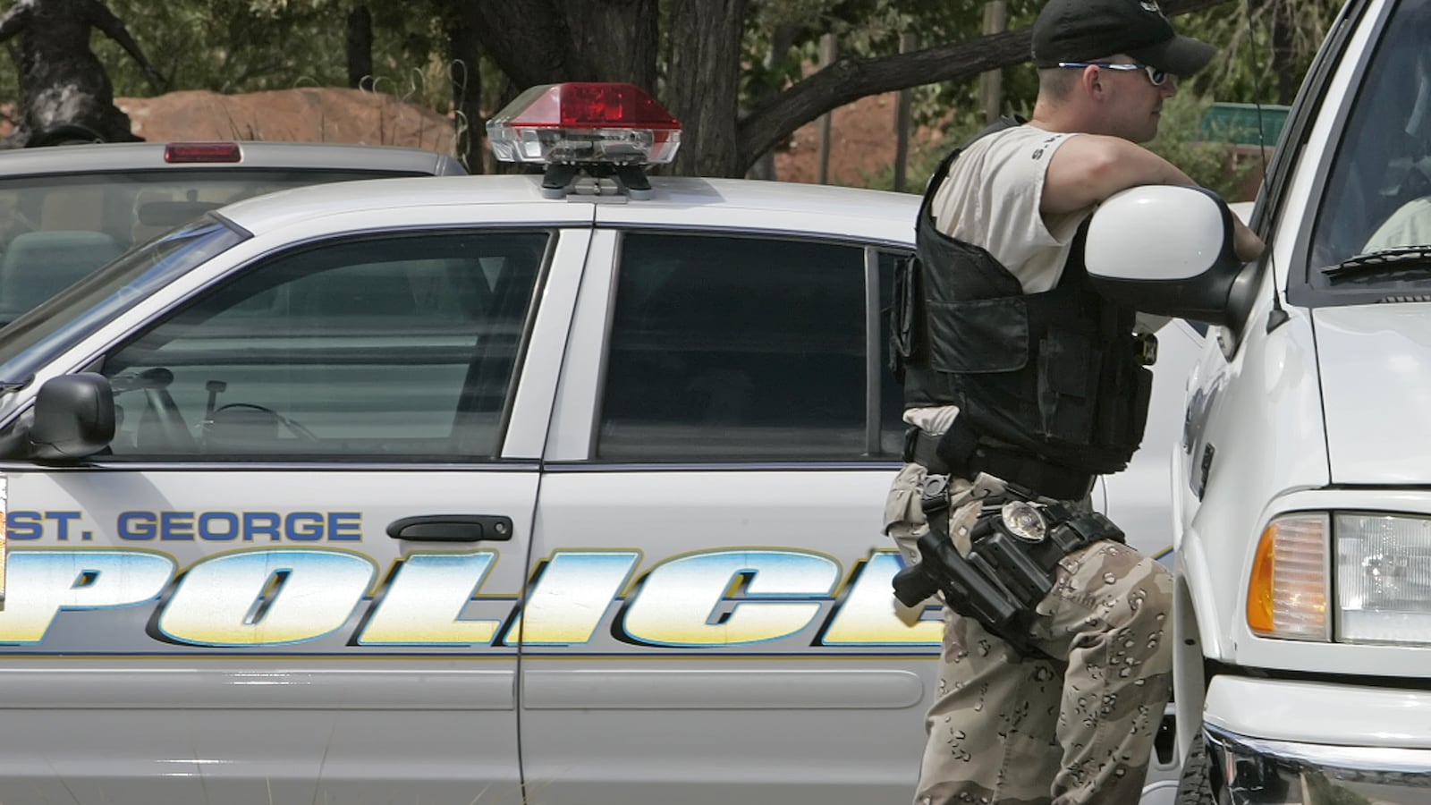 A St. George police officer stands watch outside the 5th Judicial District Courthouse for the start of the Warren Jeffs trial September 13, 2007 in St. George, Utah.