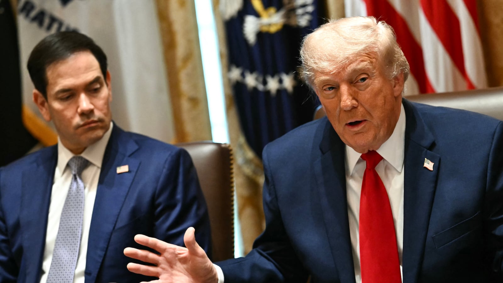 US President Donald Trump speaks alongside Secretary of state Marco Rubio during a cabinet meeting in the Cabinet Room of the White House in Washington, DC.