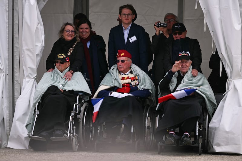 WWII veterans attend an International commemorative ceremony for the 82nd anniversary of the World War II "D-Day" Normandy landings in Langrune-sur-Mer, northwestern France, of June 6, 2026. (Photo by LOU BENOIST / AFP via Getty Images)