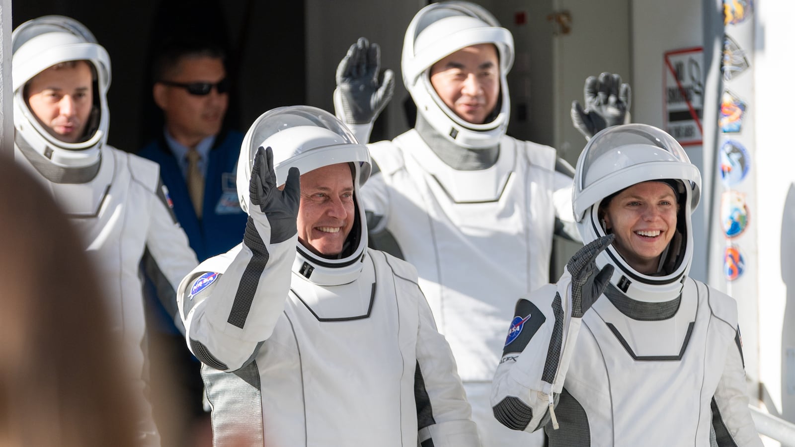Three astronauts and one cosmonaut on the Crew-11 mission to the International Space Station board their transport vehicles to the launch pad at the Neil Armstrong Operations and Checkout Building in Kennedy Space Center, FL, on July 31, 2025. (Photo by Austin DeSisto/NurPhoto via Getty Images)
