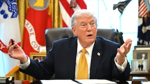US President Donald Trump speaks while signing an executive order on fraud in the Oval Office at the White House