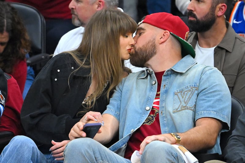Taylor Swift and Travis Kelce pay no attention during Game Three between the New York Knicks and the Cleveland Cavaliers.
