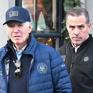 Joe Biden, accompanied by Hunter Biden and Beau Jr., walks out of a bookstore in downtown Nantucket, Massachusetts, U.S., November 29, 2024.