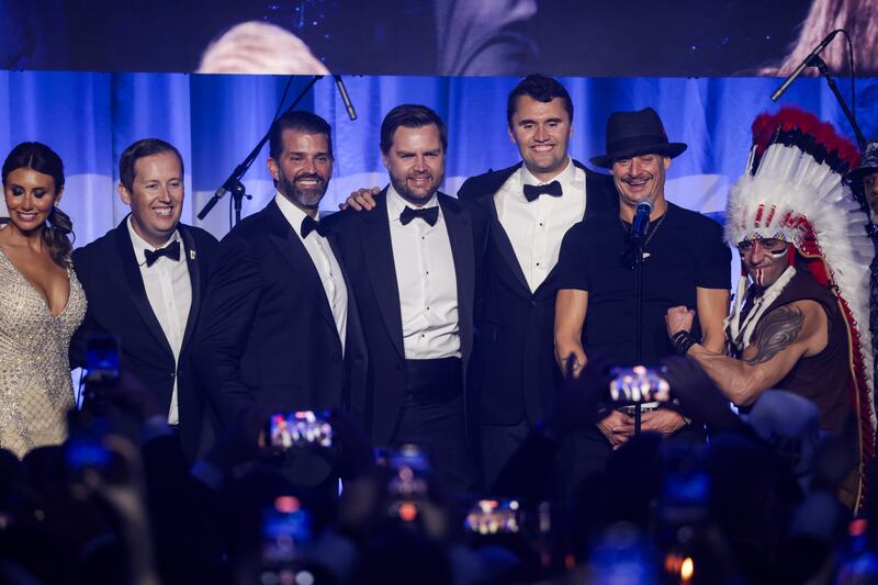 WASHINGTON, DC - JANUARY 19: (L-R) Alina Habba, Senior Advisor to President Donald J. Trump, Sergio Gor, Donald Trump Jr., U.S. Vice President-elect JD Vance, Charlie Kirk, and Kid Rock on stage with The Village People during the Turning Point USA Inaugural-Eve Ball at the Salamander Hotel on January 19, 2025 in Washington, DC. Donald Trump will be sworn in as the 47th U.S. president on January 20. (Photo by Samuel Corum/Getty Images)