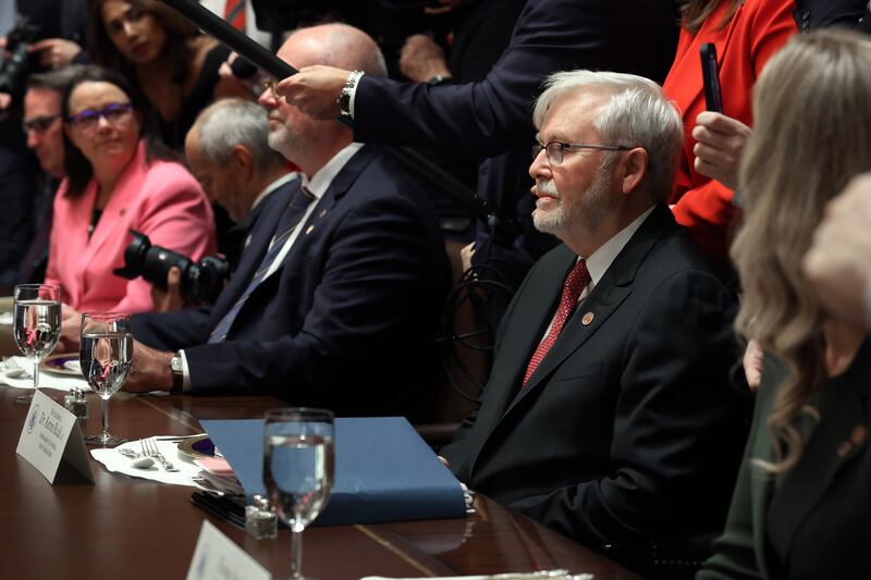 Australian Ambassador to the U.S. Kevin Rudd was sitting opposite Trump when he was called out for past comments about the president.