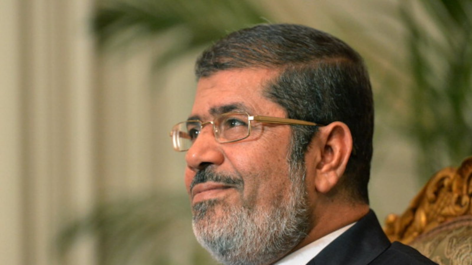 articles/2013/01/01/morsi-should-visit-jerusalem/morsi-smile-openz_yuv2vi