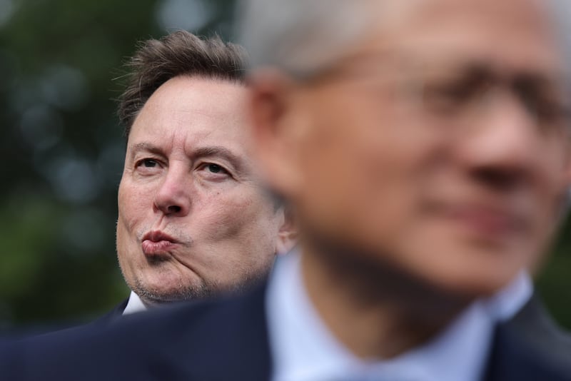 SpacexAI Founder and CEO Elon Musk and Nvidia President and CEO Jensen Huang look on at the White House driveway following a luncheon for tech leaders in the East Room, in Washington, D.C., US, September 29, 2026. REUTERS/Jonathan Ernst