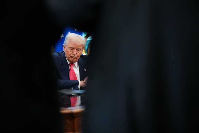 President Donald Trump answers questions from reporters in the Oval Office on August 14, 2025 in Washington, D.C.