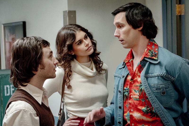 Cory Michael Smith as Chevy Chase with Gabriel LaBelle as Lorne Michaels and Kaia Gerber as Jacqueline Carlin in “Saturday Night.”