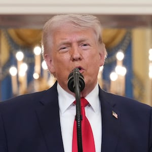 President Donald Trump speaks from the Cross Hall of the White House