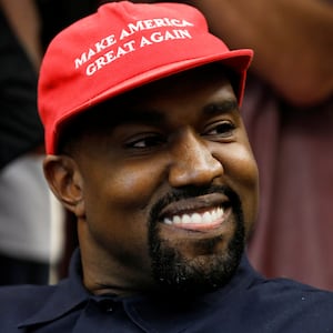Rapper Kanye West smiles during a meeting with U.S. President Donald Trump to discuss criminal justice reform at the White House in Washington, U.S., October 11, 2018. REUTERS/Kevin Lamarque
