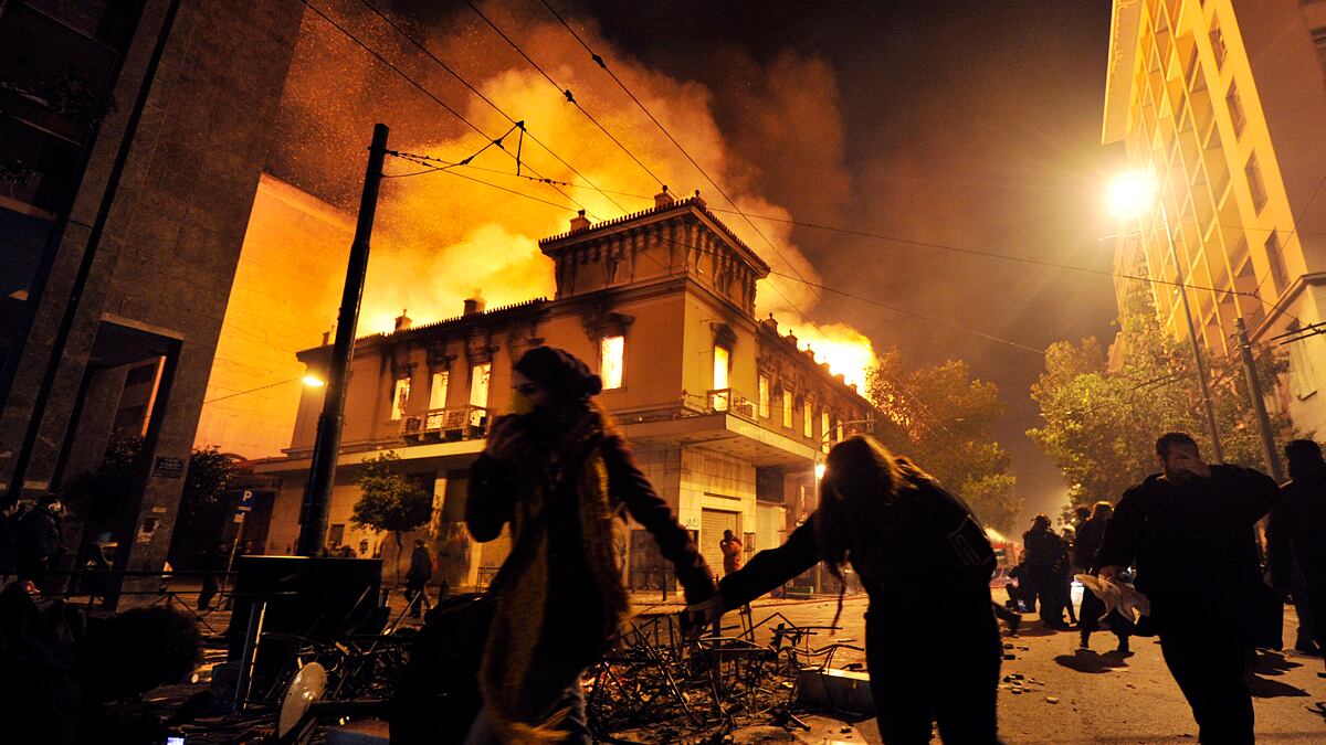 cheats/2012/02/12/greece-set-to-pass-bailout-plan/greece-austerity-protests-cheat_yrdw0n