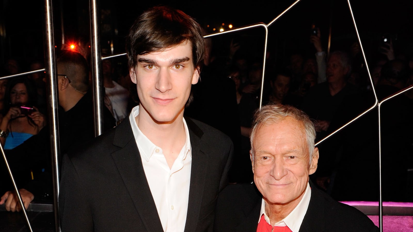Marston Hefner (L) and his father, Playboy founder Hugh Hefner, celebrate their birthdays with a cake at the Moon nightclub at the Palms Casino Resort April 9, 2011 in Las Vegas, Nevada. Marston Hefner turned 21 and Hugh Hefner turned 85.