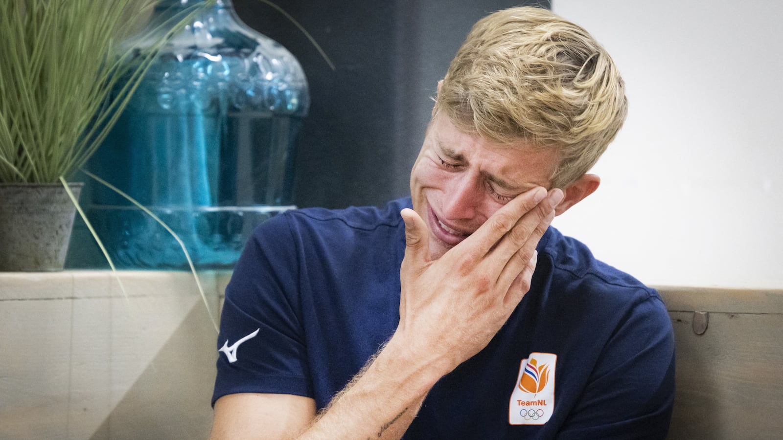 Netherlands volleyball player and convicted child rapist Steven van de Velde cries while speaking to the media about being booed during the Paris Olympics.