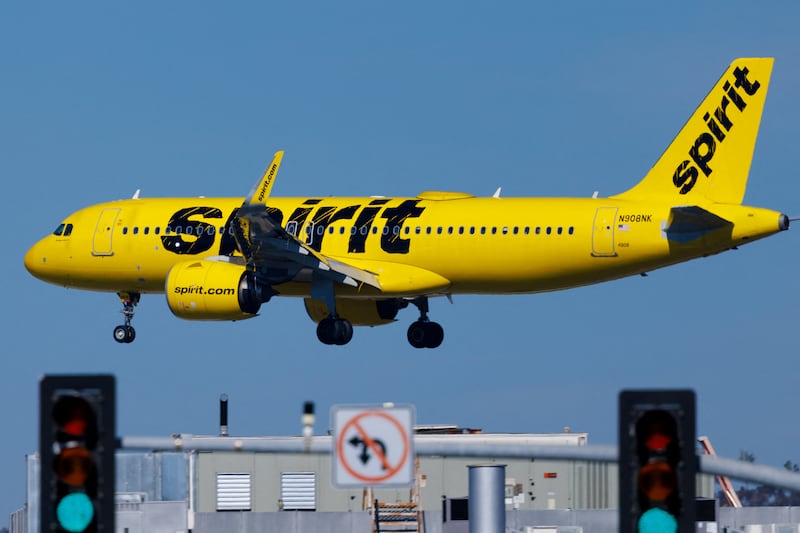 A Spirit Airlines jet on approach to land