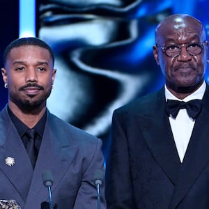 Michael B. Jordan and Delroy Lindo present the Special Visual Effects Award on stage during the EE BAFTA Film Awards 2026 at The Royal Festival Hall on February 22, 2026 in London, England.