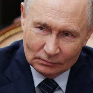 In this pool photograph distributed by the Russian state agency Sputnik, Russia's President Vladimir Putin talks to the CEO of JSC Russian Railways (RZD) during a meeting in Moscow on July 31, 2026. (Photo by Alexander KAZAKOV / POOL / AFP via Getty Images)