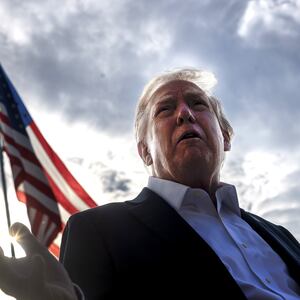 President Donald Trump speaks to members of the media as he departs the White House  September 26, 2025 in Washington, DC.