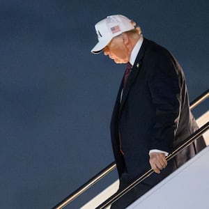 US President Donald Trump steps off Air Force One at Palm Beach International Airport in West Palm Beach, Florida, on February 27, 2026. Trump is spending the weekend at his Mar-a-Lago resort. (Photo by Mandel NGAN / AFP via Getty Images)