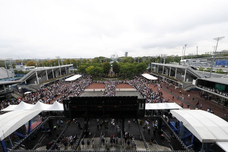Sep 7, 2025; Flushing, NY, USA;  Fans enter Arthur Ashe stadium prior to the final of men singles between Jannik Sinner (ITA) (not pictured) and Carlos Alcaraz (ESP) (not pictured) at Billie Jean King National Tennis Center.  Mandatory Credit: Mike Frey-Imagn Images