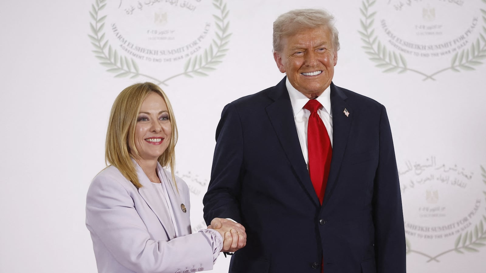 Italy's Prime Minister Giorgia Meloni (L) and US President Donald Trump