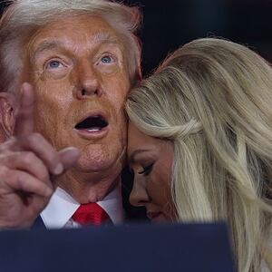 Erika Kirk joins U.S. President Donald Trump onstage during the memorial service for political activist Charlie Kirk at State Farm Stadium on September 21, 2025 in Glendale, Arizona. Kirk, the CEO and co-founder of Turning Point USA, was shot and killed on September 10th while speaking at an event during his "American Comeback Tour" at Utah Valley University. (Photo by Win McNamee/Getty Images)