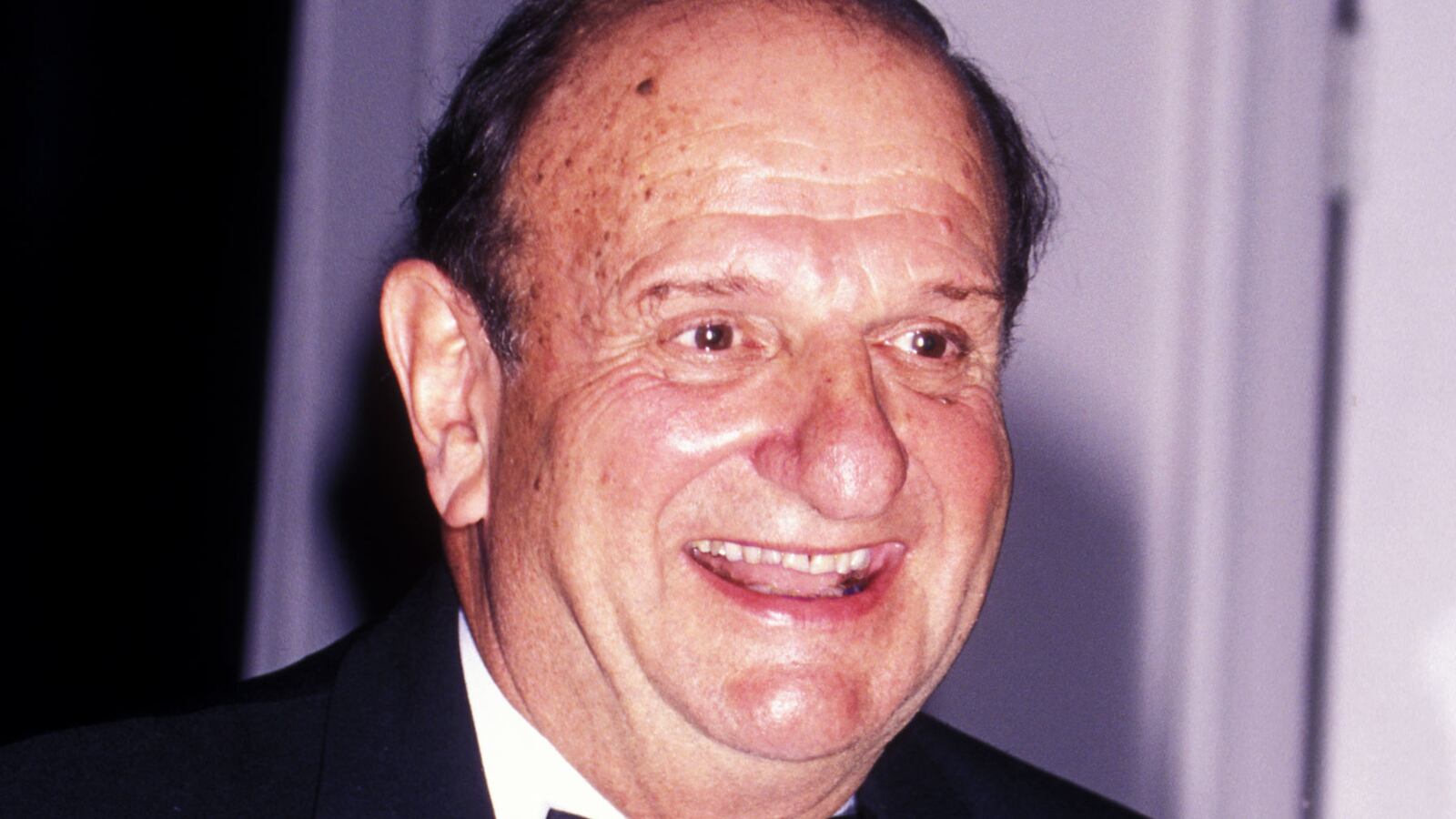 A portrait of Bo Goldman smiling from 1998.