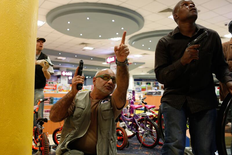 galleries/2013/09/21/gunmen-attack-nairobi-kenya-shopping-mall-photos/130922-kenya-mall3_bdiqig