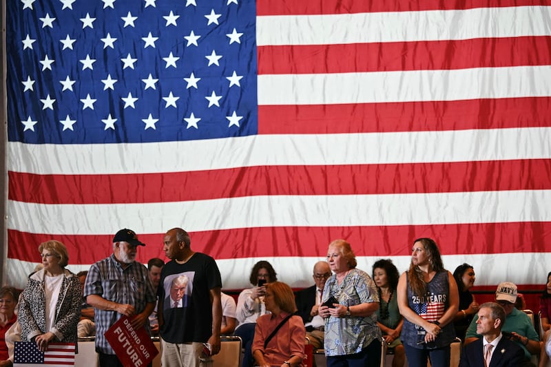 People wait for US Vice President JD Vance to arrive at a rally at Koury Convention Center in Greensboro, North Carolina, on September 21, 2026.