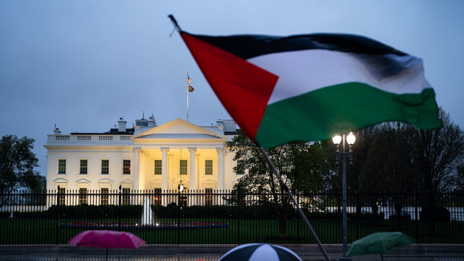 Pro-Palestinian demonstrators call for a ceasefire in Gaza during a protest as part of the "People's White House Ceasefire Now Iftar" outside the White House on April 2, 2024 in Washington, DC.