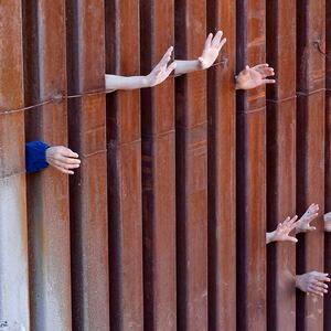 articles/2014/06/03/cardinal-o-malley-s-fight-against-global-indifference-to-immigration-s-humanitarian-crisis/140604-immigration-church-dickey-tease-new_exmsmw