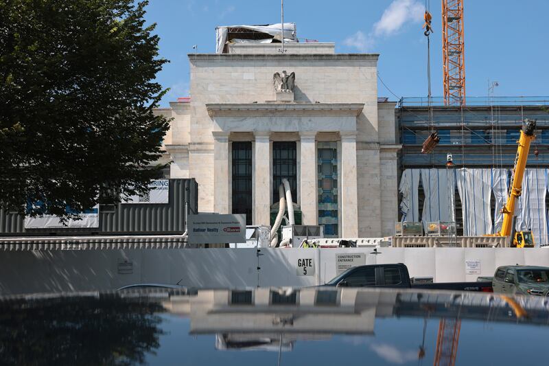 WASHINGTON, DC - JULY 17: The Federal Reserve building is seen as it goes under construction on July 17, 2025 in Washington, DC. U.S. President Donald Trump, who has been pressuring Federal Reserve chairman Jerome Powell to cut interest rates, says that he is "highly unlikely" to fire him. Office of Management and Budget director Russell Vought has asked the Powell to respond to a series of questions about cost overruns in the nearly $2.5 billion renovation by July 21st.  (Photo by Michael M. Santiago/Getty Images)