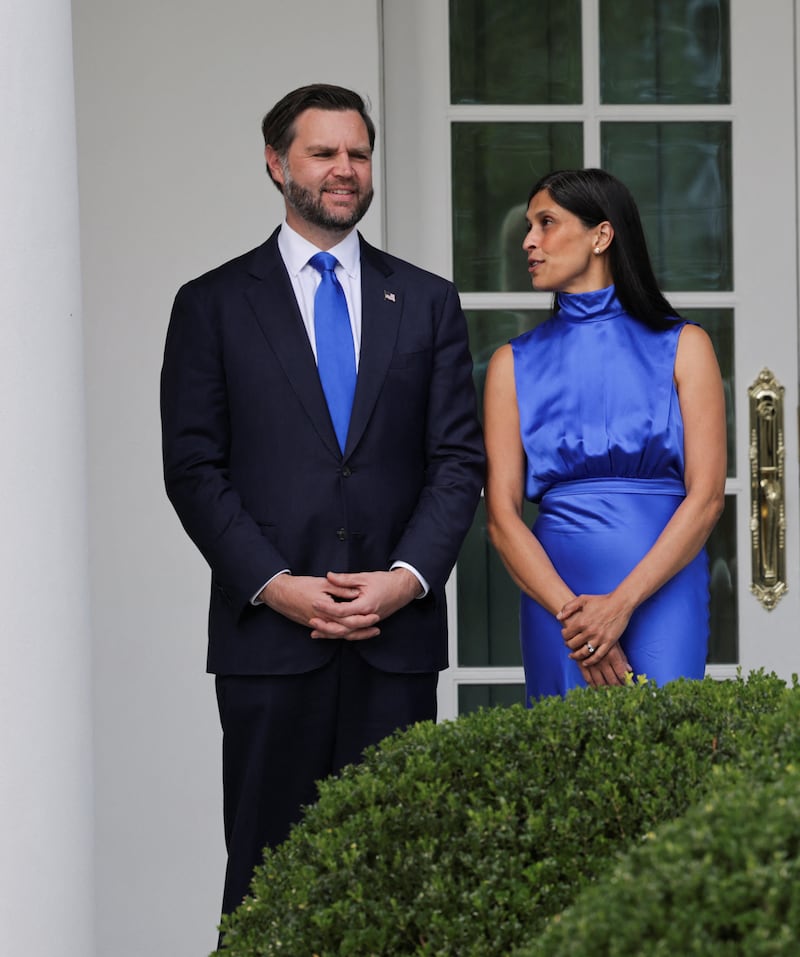 Vice President JD Vance speaks to his wife Usha Vance on the day of a state arrival ceremony for Chinese President Xi Jinping and his wife, Peng Liyuan, at White House in Washington, D.C., September 24, 2026.