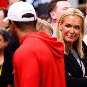 Vanessa Trump, girlfriend of Tiger Woods of Jupiter Links GC and her daughter Kai Trump talk with Woods before a match against The Bay Golf Club at SoFi Center on March 03, 2026 in Palm Beach Gardens, Florida.