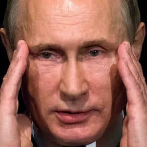 Russian President Vladimir Putin gestures as he addresses students during his visit to the German Embassy school in Moscow, Russia, June 29, 2016. REUTERS/Alexander Zemlianichenko/Pool/File Photo