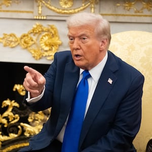 WASHINGTON,DC -   U.S. President Donald Trump met with Canadian Prime Minister Mark Carney in the Oval Office of the White House, Oct. 7, 2025, in Washington.(Photo by Sarah L. Voisin/The Washington Post via Getty Images)