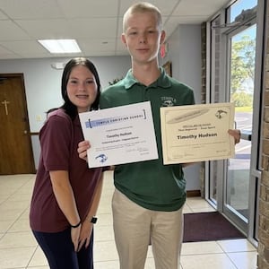 Anna Kepner poses with her stepbrother, Timothy Hudson, who has been charged as an adult in her murder on a Carnival Cruise ship.