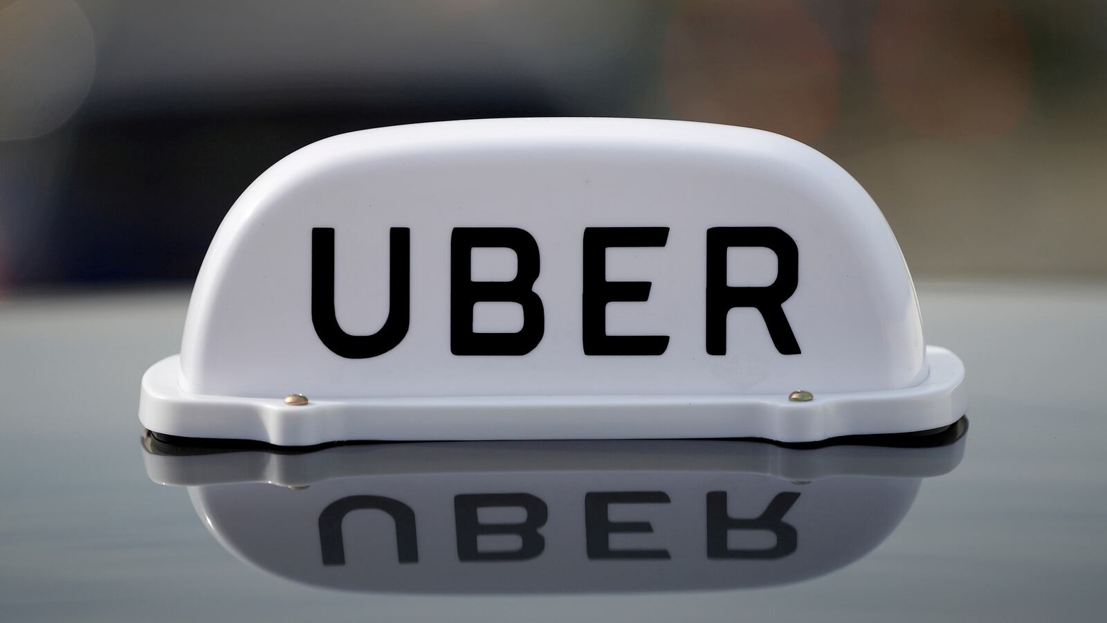 2021-03-17T000000Z_1698204126_RC2ZCM9MRRB5_RTRMADP_3_UBER-BRITAIN_ibeyc9