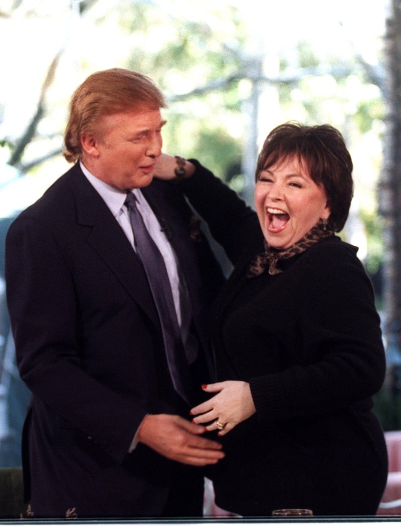 Donald Trump embraces Roseanne Barr in 1998.