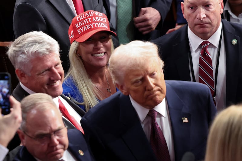 U.S. Representative Marjorie Taylor Greene (R-GA) reacts as U.S. President Donald Trump leaves after his speech to a joint session of Congress, in the House Chamber of the U.S. Capitol in Washington, D.C., U.S., March 4, 2025. REUTERS/Kevin Lamarque
