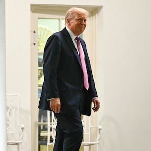 US President Donald Trump walks near a bust of Abraham Lincoln outside the Oval Office during a dinner hosted in the newly renovated Rose Garden of the White House in Washington, DC, on September 5, 2025. (Photo by Mandel NGAN / AFP) (Photo by MANDEL NGAN/AFP via Getty Images)