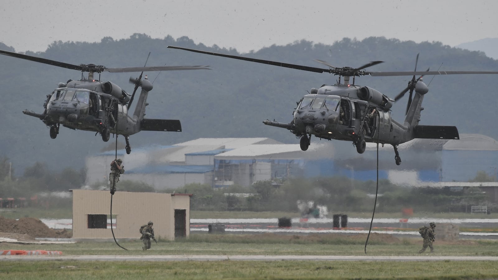 US soldiers participate in a military tactical demonstration during "Air Power Day" preview at US Osan Air Base in Pyeongtaek on September 20, 2019.