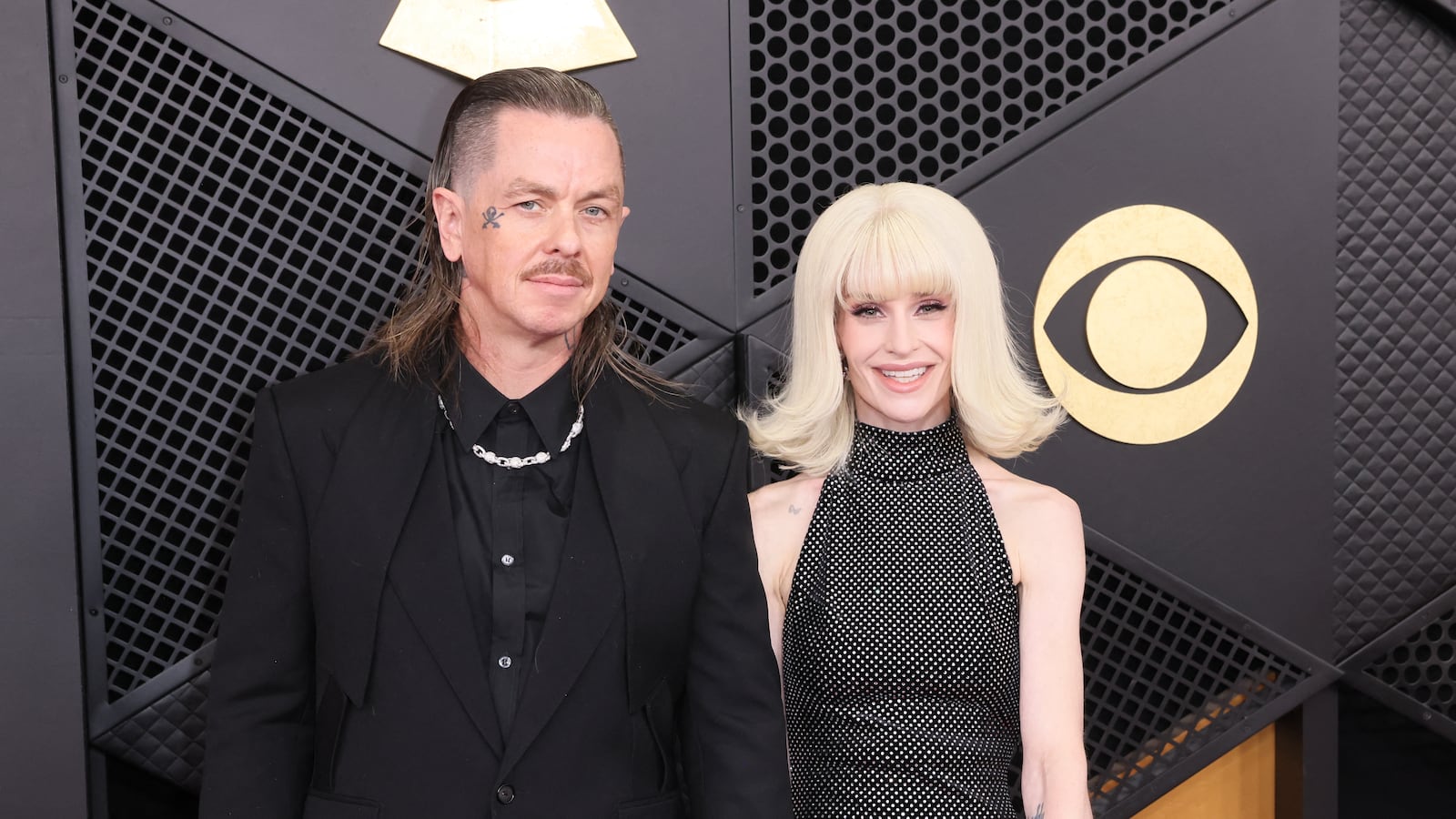 US DJ Sid Wilson and English TV personality Kelly Osbourne arrive for the 68th Annual Grammy Awards.