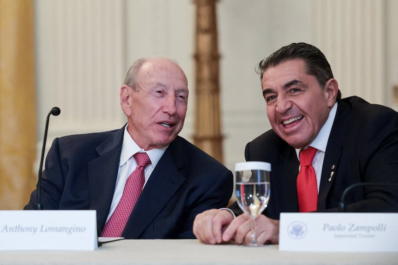 Anthony Lomangino, a sanitation and recycling businessman and a Trump nominee to the U.S. Postal Service Board of Governors, and Paolo Zampolli, a friend of President Donald Trump and Trump’s envoy for global partnerships, attend a lunch with the Kennedy Center board members in the East Room of the White House