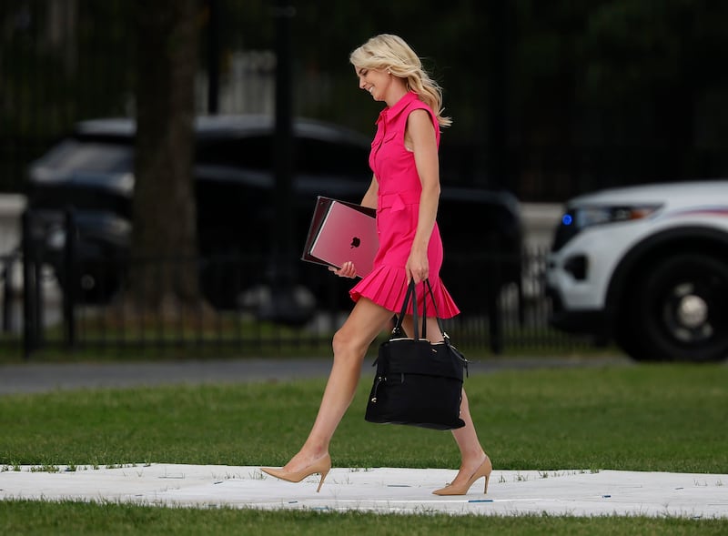 Natalie Harp, assistant to U.S. President Donald Trump, walks from Marine One after landing at the Ellipse near the White House on August 28, 2026 in Washington, DC.