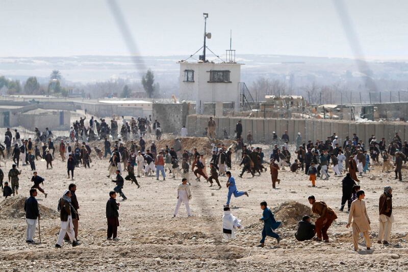 galleries/2012/02/23/quran-burning-protests-turn-deadly-in-afghanistan-photos/afghanistan-koran-burning-protest-scene_yc9eac